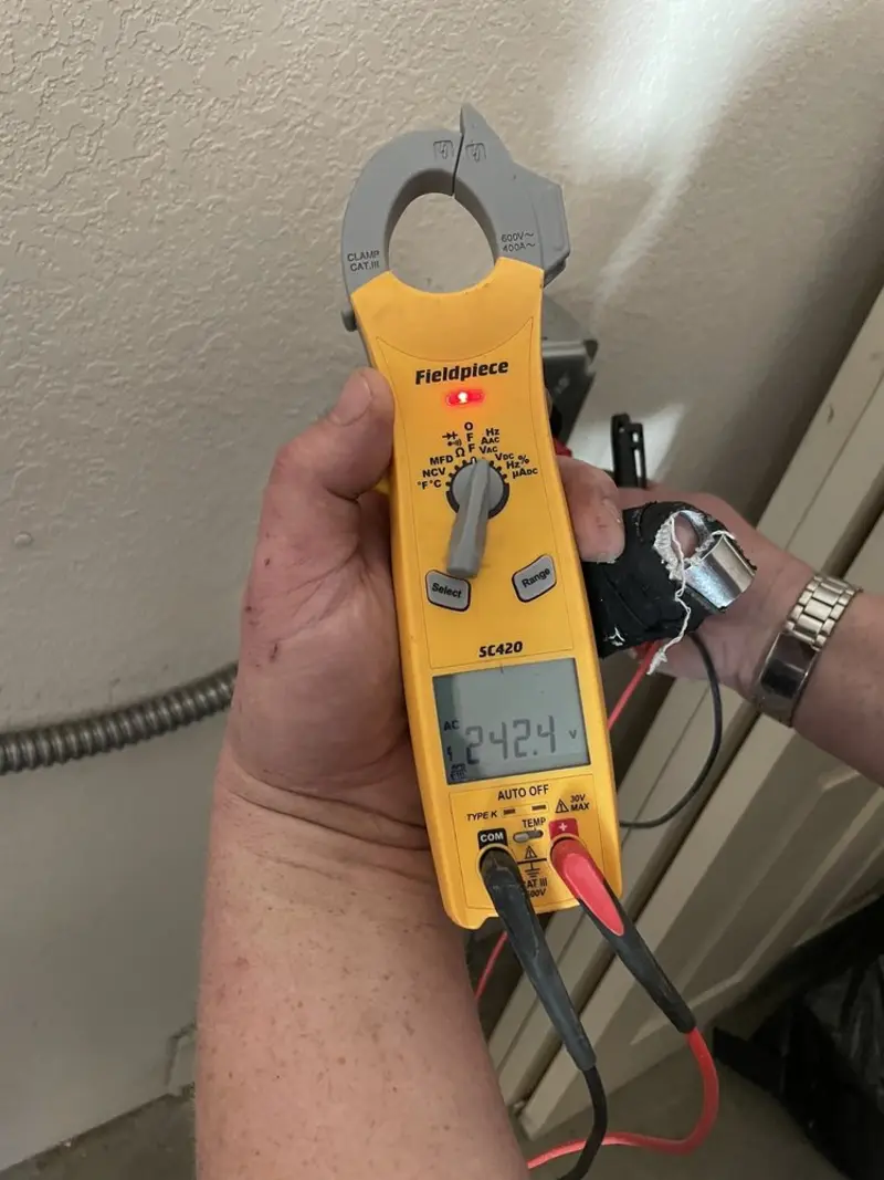 Voltage testing with clamp meter during Ceiling Fan Installation in Wanaque